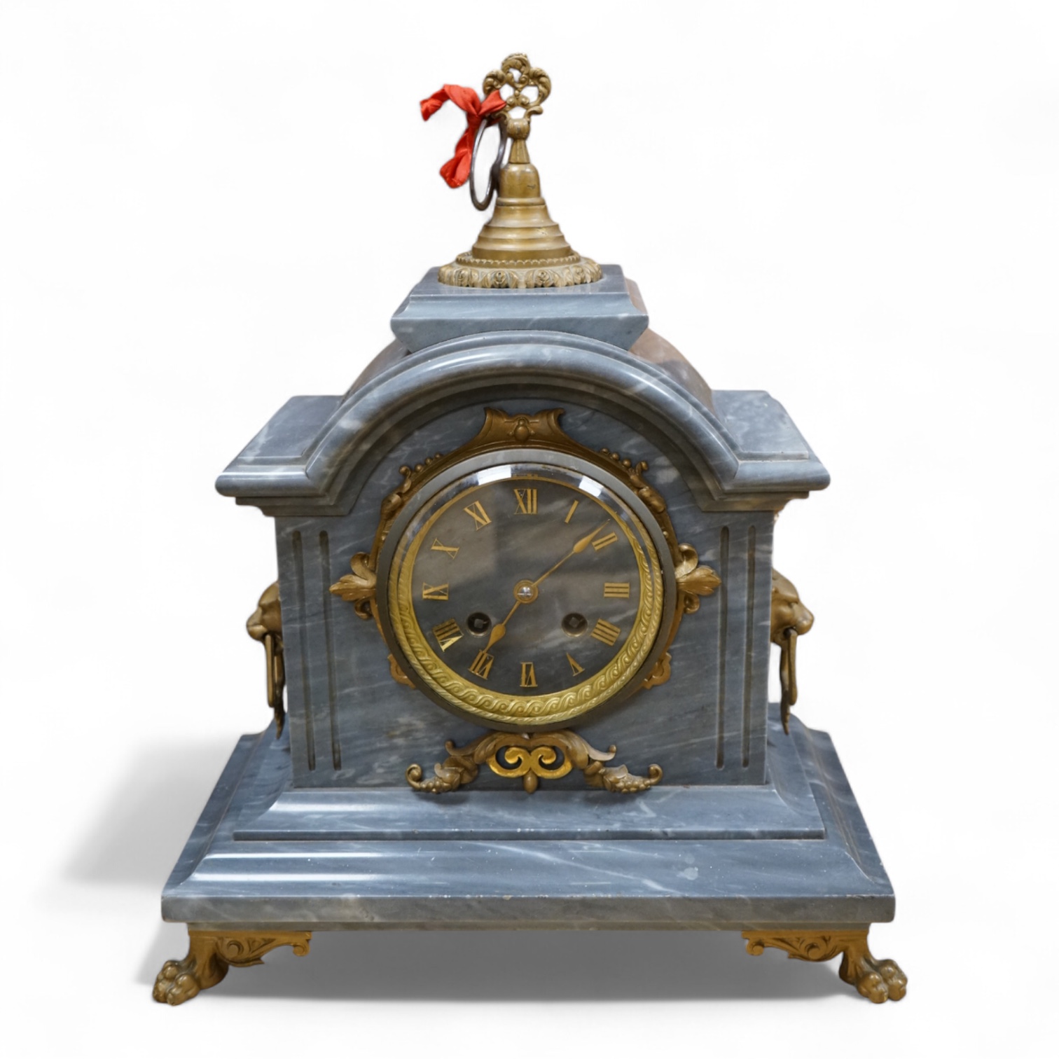 A grey marble mantel clock, H Marc movement, gilt-metal feet, handles and finial. 35cm high. Condition - good